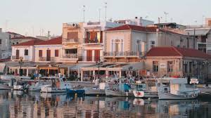 Private day cruise from Alimos to Aegina town with swimming, local lunch and snorkeling in clear waters