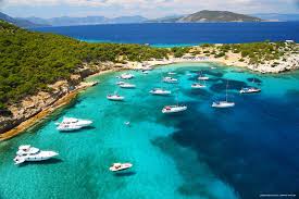 Private day cruise from Alimos to Moni island with swimming, local lunch and snorkeling in clear waters