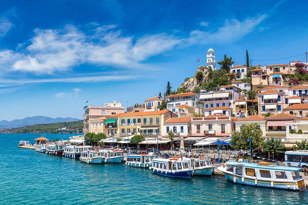 Day cruise from Alimos to Russian Bay, Poros town and Katramonisi with swimming, sightseeing, and local charm